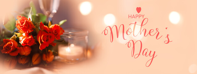 Still life background for mother's day greetings with red roses and tulips on light apricot tone with shiny bokeh. Horizontal background with champagne and candlelight. English text. - 714138688