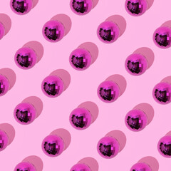 Disco balls on pink background. Party creative concept.