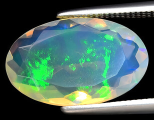 natural multi color rainbow opal gem on the background
