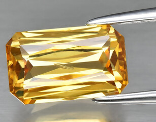 natural yellow zircon gem on the background
