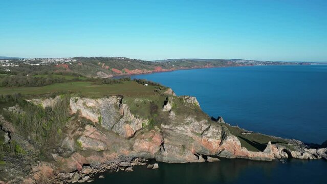 Babbacombe, Torbay, South Devon, England: DRONE VIEWS: Anstey's Cove, a former limestone quarry and Walls Hill. The Cove is associated with smuggling and the crime writer, Agatha Christie (Clip 4).