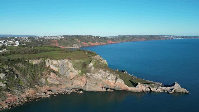 Babbacombe, Torbay, South Devon, England: DRONE VIEWS: Anstey's Cove, the former limestone quarry and Walls Hill. The Cove is assoiated with smuggling and the crime writer, Agatha Christie (Clip 6).