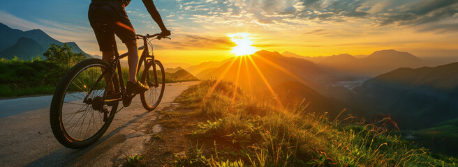 Silhouette of a cyclist at sunrise on a mountain path, bike in sharp focus, sun peeking over the mountains, long shadow stretching, vibrant sky colors, natural light .