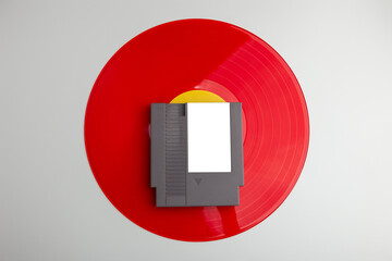 retro game soundtrack 8-bit game cartridge on a vinyl record