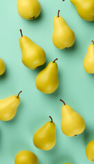 A vibrant arrangement of fresh, ripe pears on a clean white background, capturing the essence of healthy and organic fruit