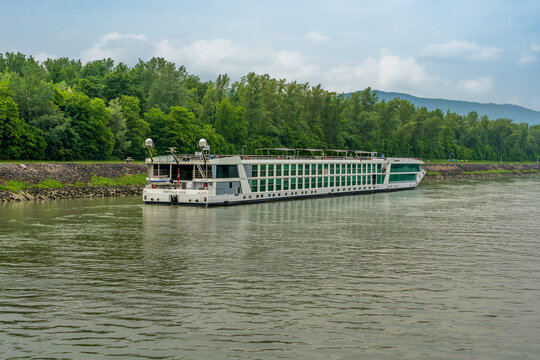 Emmersdorf, Lower Austria - AT - June 8, 2023 The 3544 ton Emerald Sun, a river cruise ship built by Hardinxveld-Giessendam, Holland in 2013 for Emerald Waterways cruising along the Danube River.