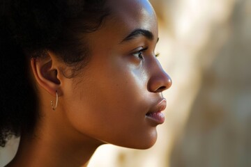 Fototapeta premium Close-Up of Womans Face and Ear