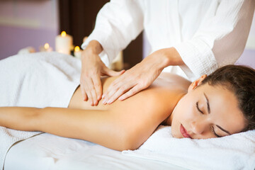 Fototapeta na wymiar Massage of human foot in spa salon