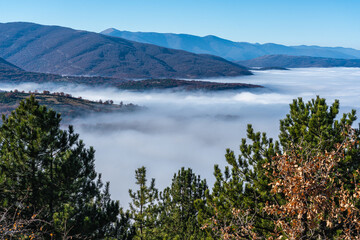 Beautiful foggy landscape in the Abruzzo National Park near the village of Gioia dei Marsi. Abruzzo, Italy.