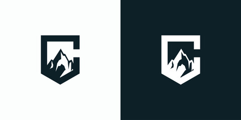 Letter C vector logo design with shield shape and mountain silhouette.