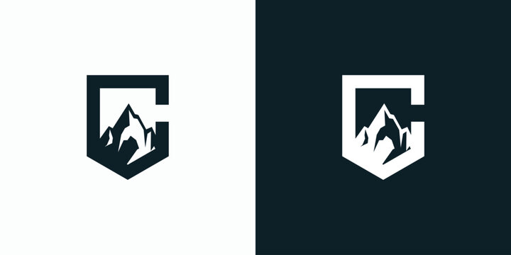 Letter C vector logo design with shield shape and mountain silhouette.