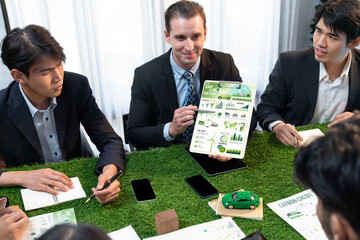 Diverse group of business people planning business marketing with environmental responsibility for...