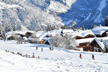 Courchevel ski resort by winter with its beautiful chalets on the slopes 