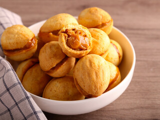 Nut shaped cookies with caramel