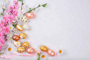 Abstract Easter composition,spring banner with sakura flowers and painted eggs,Easter holidays...