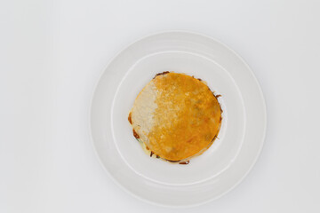 Birria mulitas on a white plate viewed from above
