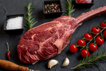 raw Steak 
Tomahawk on stone background 