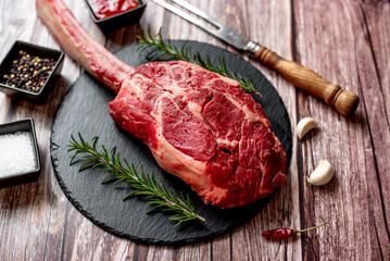 raw steak
Tomahawk on wooden background
