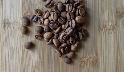 Organic Brazilian roasted coffee beans background.