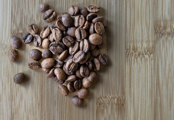 Organic Brazilian roasted coffee beans background.