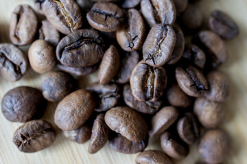 Organic Brazilian roasted coffee beans background.