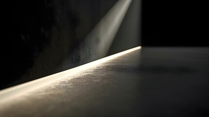 a light shines on a wall in a dark room