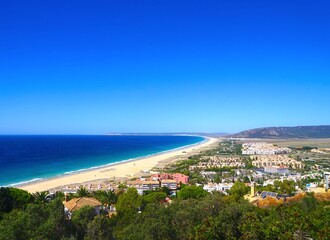 view from the moutains over the beautiful endless sandy beach between Atlanterra, Zahara de los Atunes and Barbate at the Costa de la Luz, Andalusia, Spain © keBu.Medien