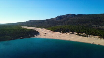 aerial view of the beautiful beach and high sand dune of Bolonia at the Costa de la Luz, Andalusia, Cadiz, Spain