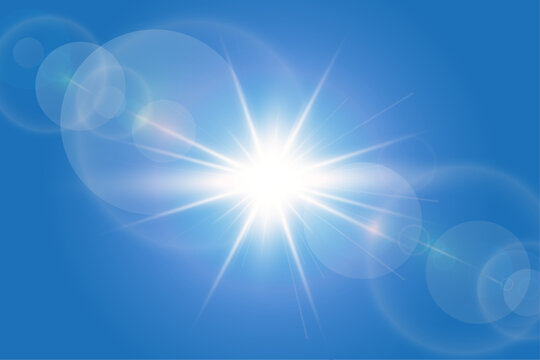 Sunny blue background with bright sun and lens flare