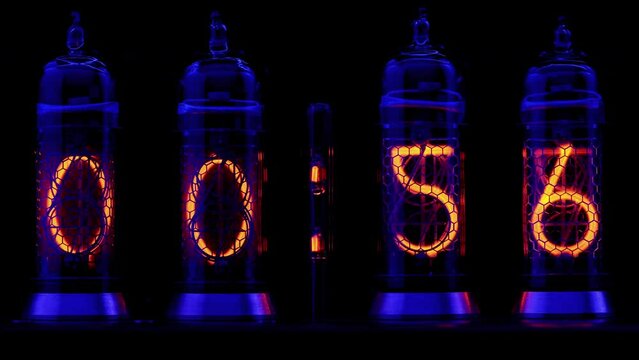 Vintage lamp timer, close up. One-minute countdown. Retro vacuum tube display on the vintage lamp timer, countdown seconds. 