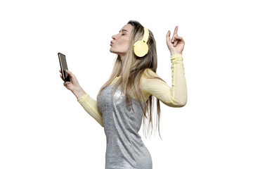 woman with headphones and cellphone