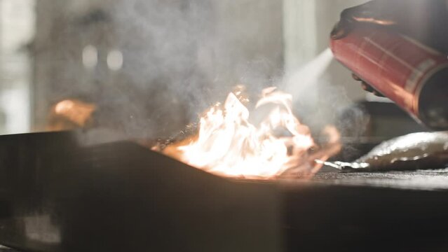 Close Up of a Person Cooking Pasta on a Stove