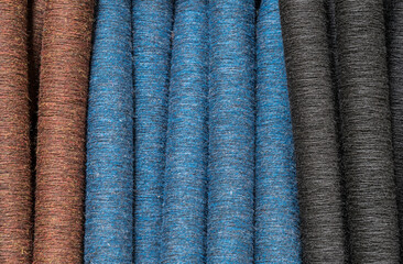 spools of colorful fabrics