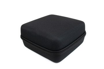 Black case for storing and carrying things with a lock. The box is a close-up, isolated on white.