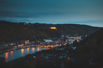 Tourist famous destination town Dinant in Wallonia region in the early evening. The town is spread...