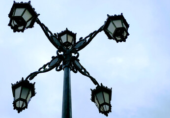 Fototapeta na wymiar Streetlight with four bulbs