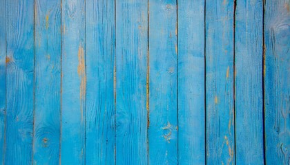 Fototapeta na wymiar light blue old wooden background of boards old worn cracked paint bright saturated color
