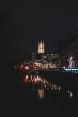 Evening city centre of Ghent in the Flanders region, Belgium. View of the Belfry of Ghent. The very famous towers that are landmarks of Gante