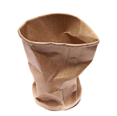 Disposable crumpled, brown paper cup for throwing away and recycling isolated on white background with clipping path