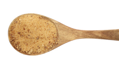 Unrefined brown cane sugar in wooden spoon isolated on white, top view