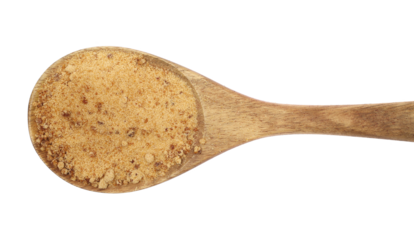 Unrefined brown cane sugar in wooden spoon isolated on white, top view