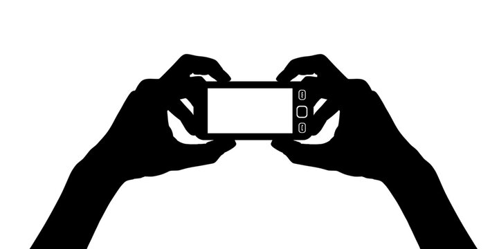 Smart mobile phone in woman hands vector silhouette illustration isolated on white background. Cell phone take a photo and send picture by internet on social network. Entertainment gadget.