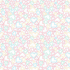 seamless background with colored hearts