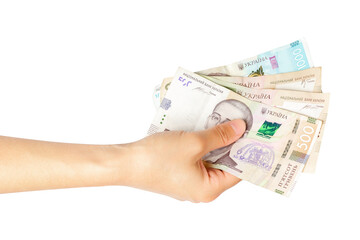 Hands Holding Ukrainian Hryvnia: Grasping the National Currency