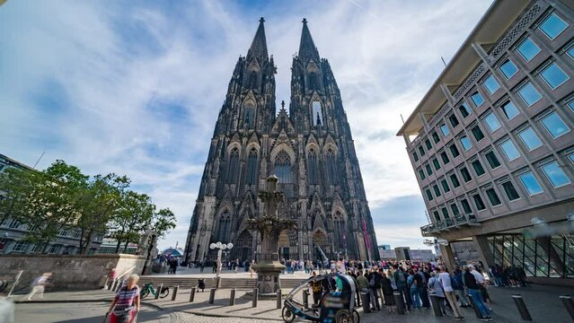 Cologne cathedral (dome) time lapse, hyperlapse footage of city cologne germany in front cologne church cathedral people walking in front.