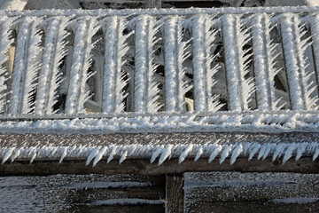 detail of  Egge tower with ice and snow