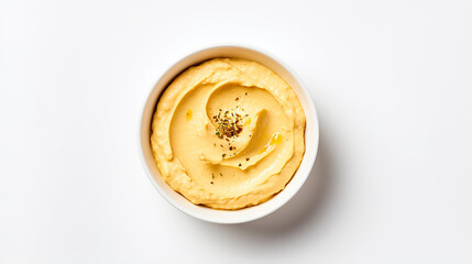 Bowl of hummus with greens and olive oil on white background, top view, copy space