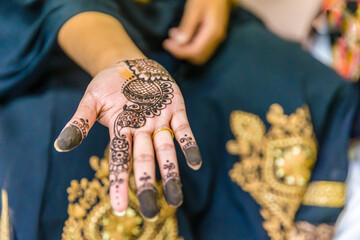 Indian bride's henna mehendi mehndi hands close up