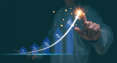 Financial interest rates and mortgage rates concept. Businessman pointing to arrow graph corporate future growth plan, Financial investment, Percentage of interest or tax, Marketing plan to target. - obrazy, fototapety, plakaty