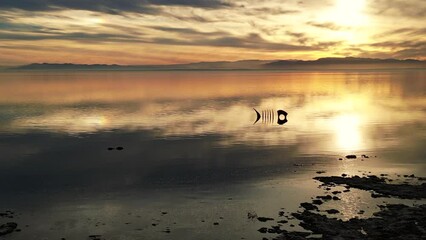 December 27, 2023: Sunset on the Salton Sea from a UAV Drone with a a beautiful Cloudy Sky 